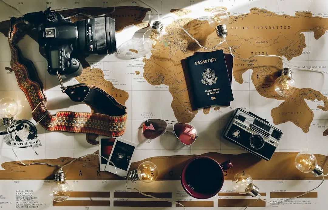 travel documents and map spread out on a table for planning